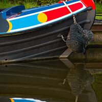 Buy canvas prints of Colourful reflections of a narrowboat  by George Robertson
