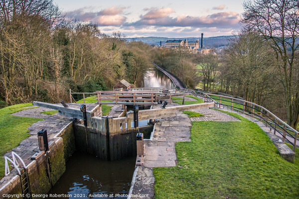 Five Rise Locks at the canal in Bingley Picture Board by George Robertson