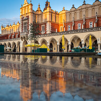 Buy canvas prints of Cloth Hall Sukiennice building at sunrise by George Robertson