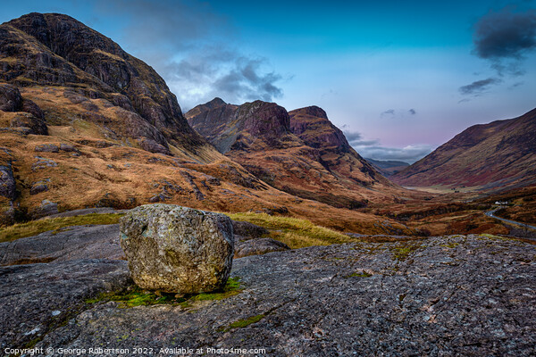 An Erratic rock above Glencoe Valley at sunrise Picture Board by George Robertson