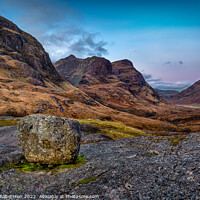 Buy canvas prints of An Erratic rock above Glencoe Valley at sunrise by George Robertson