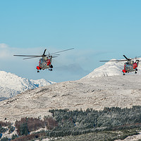 Buy canvas prints of Helicopters Two Rescue Sea Kings flying near Ben L by George Robertson