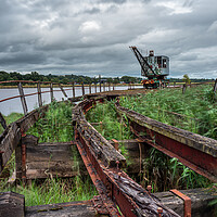 Buy canvas prints of The rail mounted crane on the  old Admiralty pier at Bandeath Munitions Depot by George Robertson