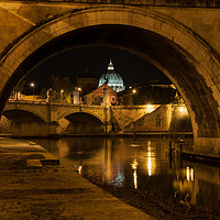 Buy canvas prints of St Peter's through an Arch on the Tiber, Italy by Ian Collins