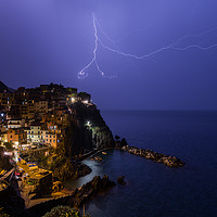 Buy canvas prints of Lightning Storm Over Manarola II, Italy by Ian Collins