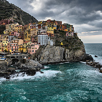 Buy canvas prints of Stormy Early Morning in Manarola by Ian Collins