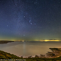 Buy canvas prints of Fall Bay on Gower in Wales at Night by Dan Santillo