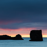 Buy canvas prints of Dyrhólaey Sea Stacks, Iceland by Dan Santillo