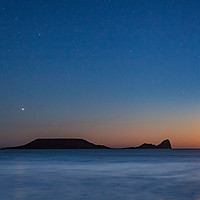 Buy canvas prints of Worms Head with the Moon Setting by Dan Santillo