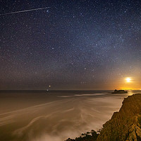 Buy canvas prints of The Moon over Worms Head, Rhossili at Night by Dan Santillo