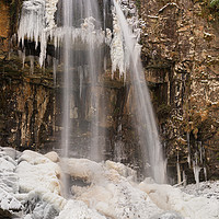 Buy canvas prints of A Frozen Melincourt Waterfall, Resolven by Dan Santillo