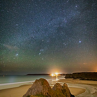 Buy canvas prints of Three Cliffs Bay, Gower at Night with Sirius by Dan Santillo