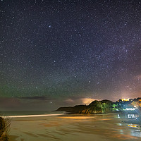 Buy canvas prints of Caswell Bay, Gower at night with airglow by Dan Santillo