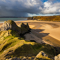 Buy canvas prints of A sunny winter afternoon at Three Cliffs Bay, Gowe by Dan Santillo