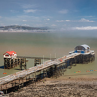 Buy canvas prints of Mumbles Pier and Lifeboat Station, Mumbles, Wales by Dan Santillo