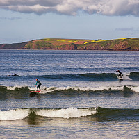 Buy canvas prints of Surfing at Manorbier in Pembrokeshire by Dan Santillo