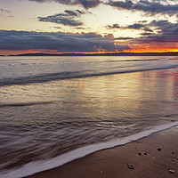Buy canvas prints of Mumbles across Swansea Bay at sunset by Dan Santillo