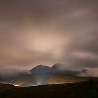 Buy canvas prints of Snowdon peaking through the clouds by Dan Santillo