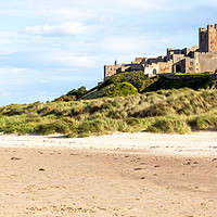 Buy canvas prints of Bamburgh Castle by Richard Whitley