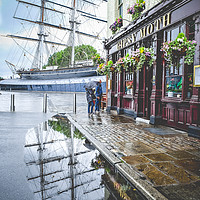 Buy canvas prints of Cutty Sark in a puddle by Sara Melhuish