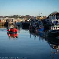 Buy canvas prints of Fishing boat reflections by Sara Melhuish