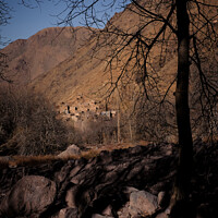 Buy canvas prints of A village nestled in the mountains by Sara Melhuish