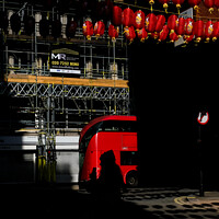 Buy canvas prints of Red bus and lanterns by Sara Melhuish