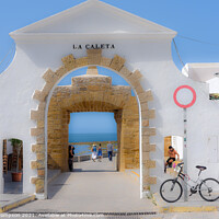 Buy canvas prints of The entrance to La Caleta beach in Cadiz by Piers Thompson
