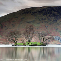 Buy canvas prints of Island reflections in Crummock water  by Russell Burton