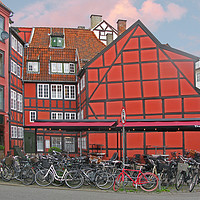 Buy canvas prints of The Red Bicycle, Copenhagen, Denmark by Chris Langley