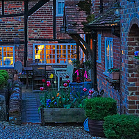 Buy canvas prints of Evening in the courtyard by Chris Langley