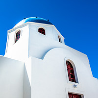 Buy canvas prints of Santorini Blue domed Church by Paul Andrews
