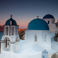 Buy canvas prints of Oia Blue domed Church by Paul Andrews