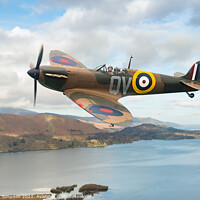 Buy canvas prints of Spitfire over Derwent Water, Cumbria by Gregg Simpson