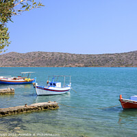 Buy canvas prints of Colourful Boats in Elounda Bay, Crete, Greece by Kasia Design