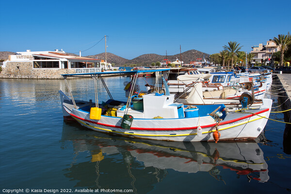 Vibrant Fishing Boats in Elounda Harbour Picture Board by Kasia Design