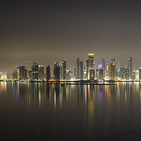 Buy canvas prints of Evening Reflections of Downtown Doha by Kasia Design
