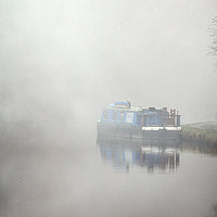 Buy canvas prints of Houseboat on the Grand Union Canal in the fog  by Rosalind White