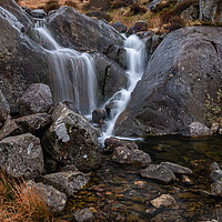 Buy canvas prints of Small waterfall by Clive Ashton