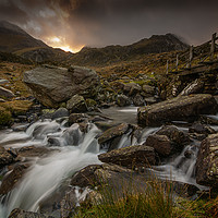 Buy canvas prints of Dawn over Tryfan by Clive Ashton