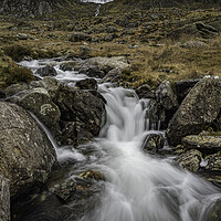 Buy canvas prints of Welsh Wintery Waterfall by Clive Ashton