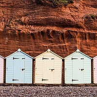 Buy canvas prints of Beach hut row in pastel colors, red rock backgroun by marcin jucha
