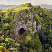 Buy canvas prints of Thor's Cave  in early Autumn light by Chris Drabble