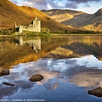 Buy canvas prints of Kilchurn Castle at dawn reflected in Lock Awe by Chris Drabble