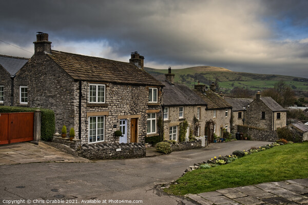Castleton under stormy clouds Picture Board by Chris Drabble