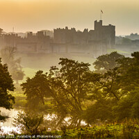 Buy canvas prints of Alnwick Castle at sunset by Chris Drabble