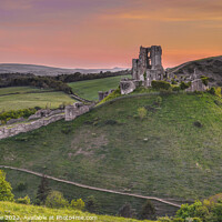 Buy canvas prints of Corfe Castle at sunset by Chris Drabble