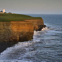 Buy canvas prints of Nash Point and Lighthouse at sunset by Chris Drabble