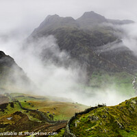 Buy canvas prints of The Langdale pikes in the grip of a storm by Chris Drabble