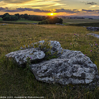 Buy canvas prints of Arbor Low at sunset by Chris Drabble